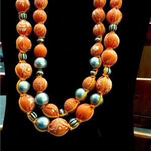 NWOT Beautiful Orange Color Necklace in 11” length
